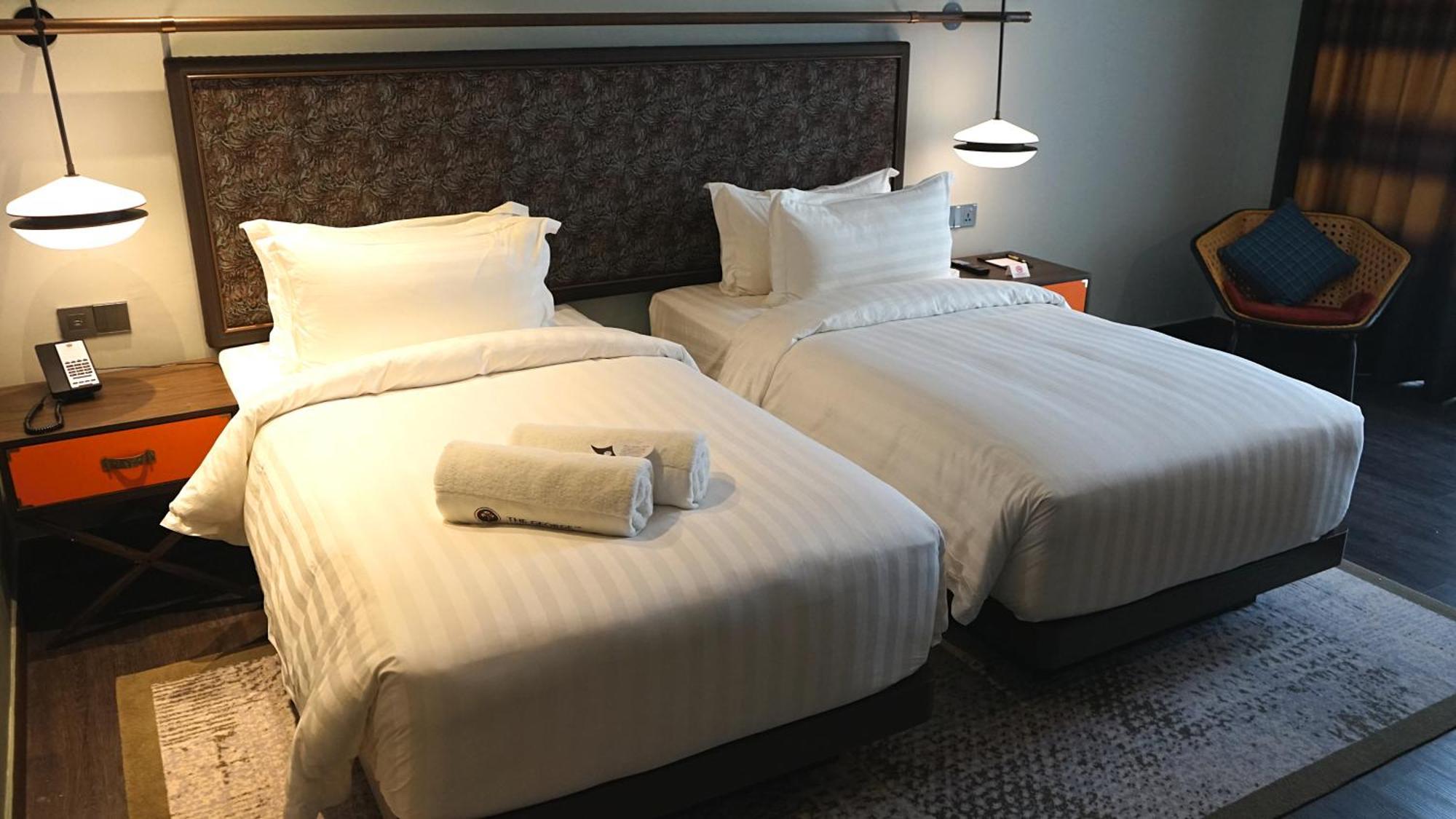 Hotel The George Penang By The Crest Collection Georgetown Exterior foto Two single beds
